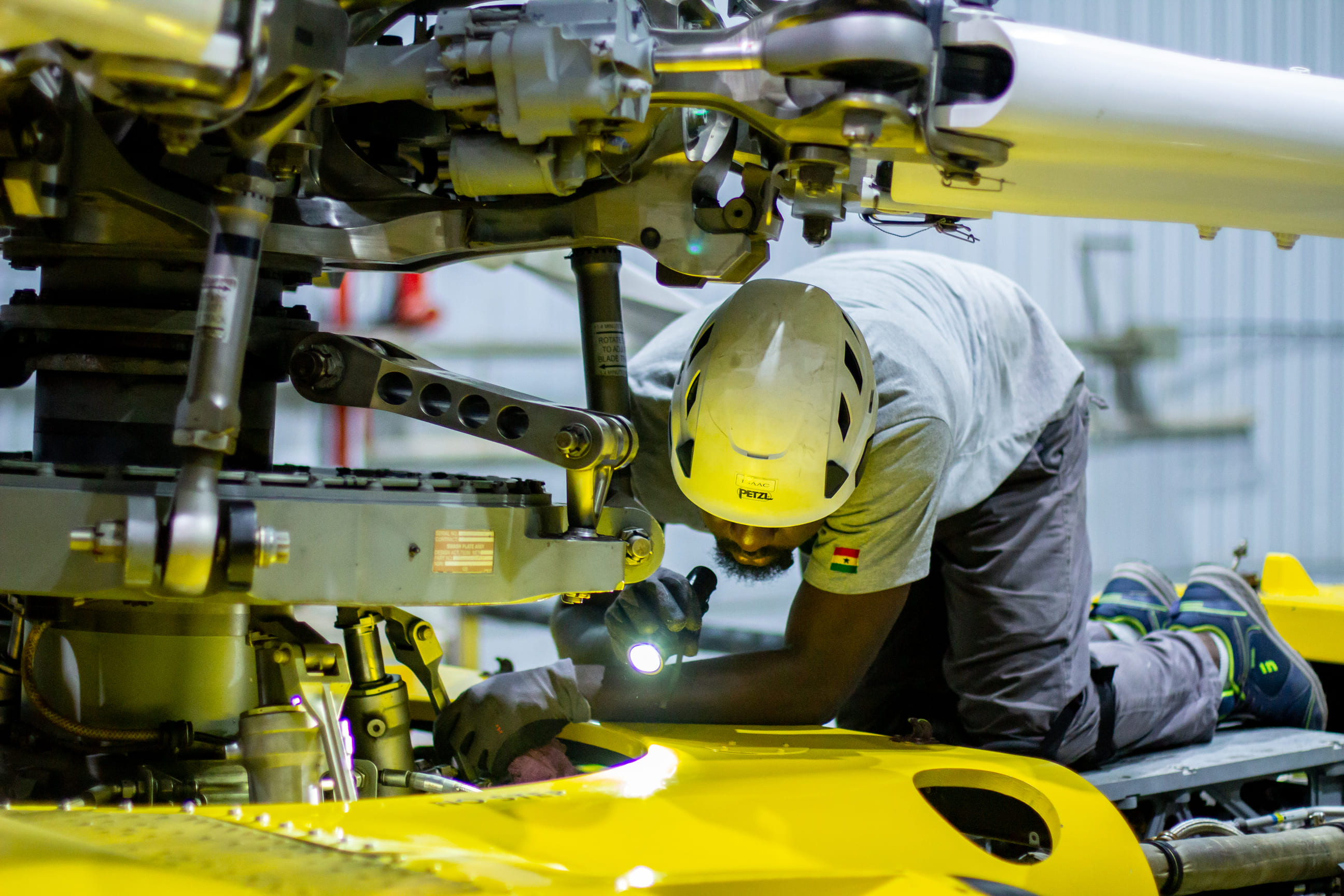 Ghanaian Engineer Servicing Aircraft